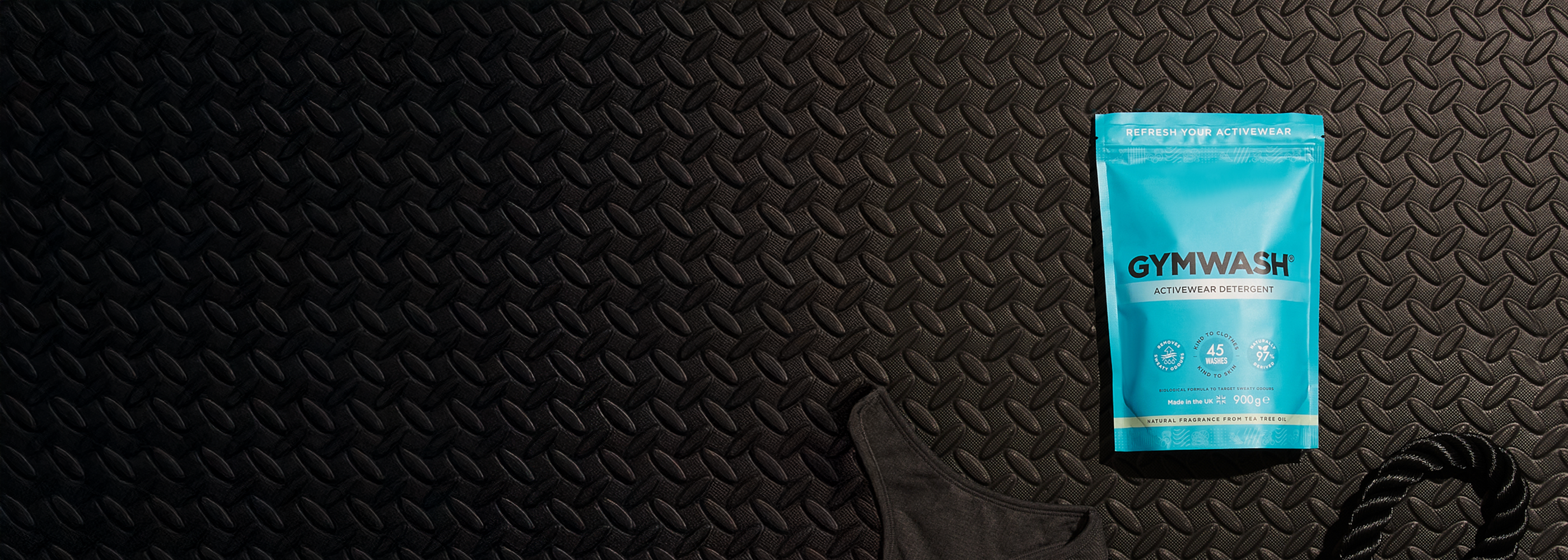 GYMWASH pouch on a gym floor.